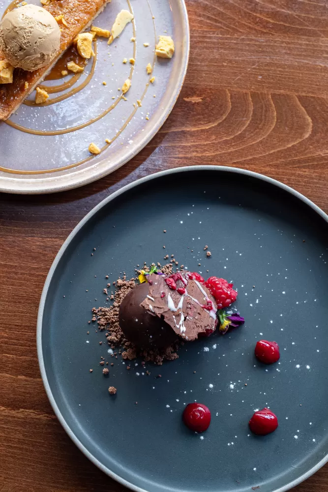 A Chocolate Sphere and a Salted Caramel Tart served at Barnstaple Restaurant 62 The Bank