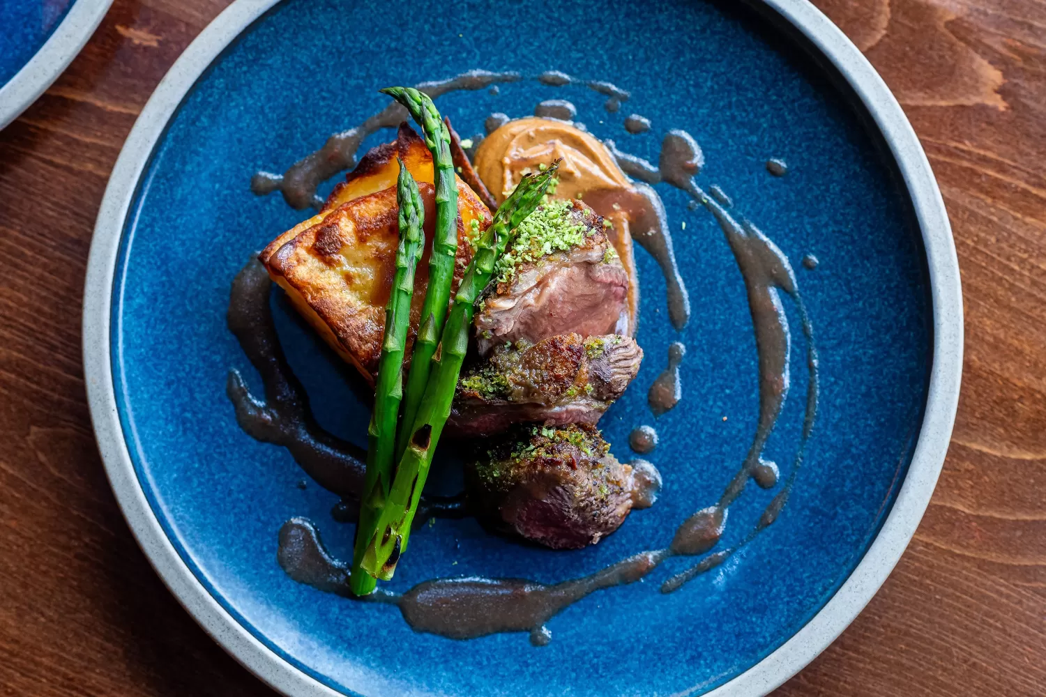 Aerial view of a Herb Crusted Lamb Loin dish