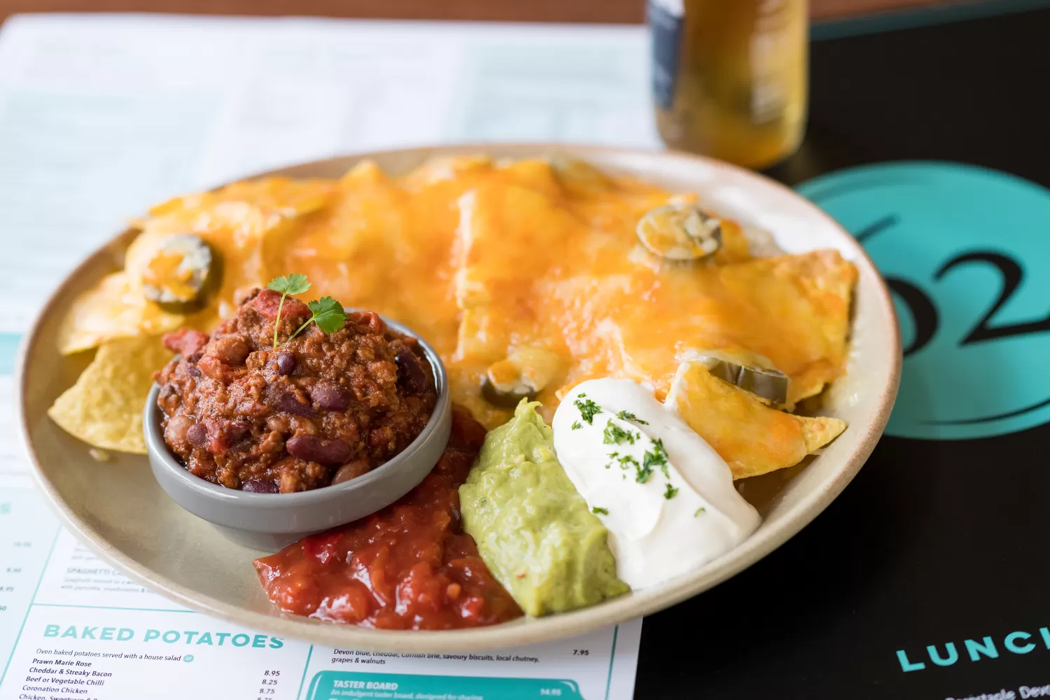 A delicious Mexican plate of Beef Chilli Nachos served at a Barnstaple Restaurant