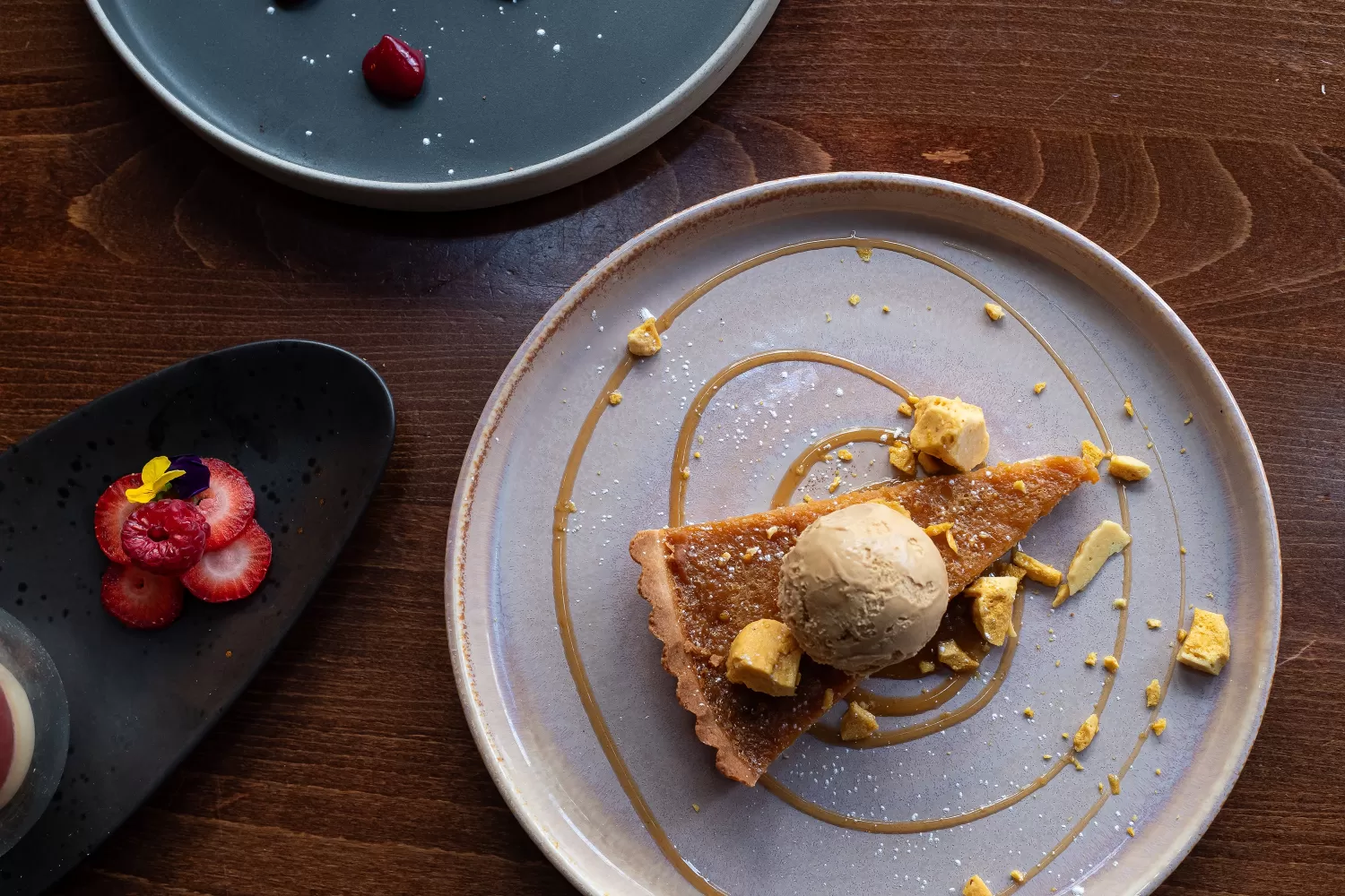 A birdseye view of a Salted Caramel Tart, dessert at 62 The Bank