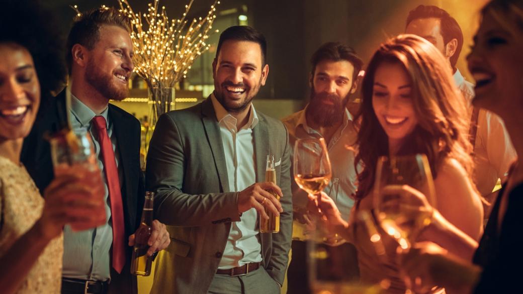 Group of people enjoying drinks at a party